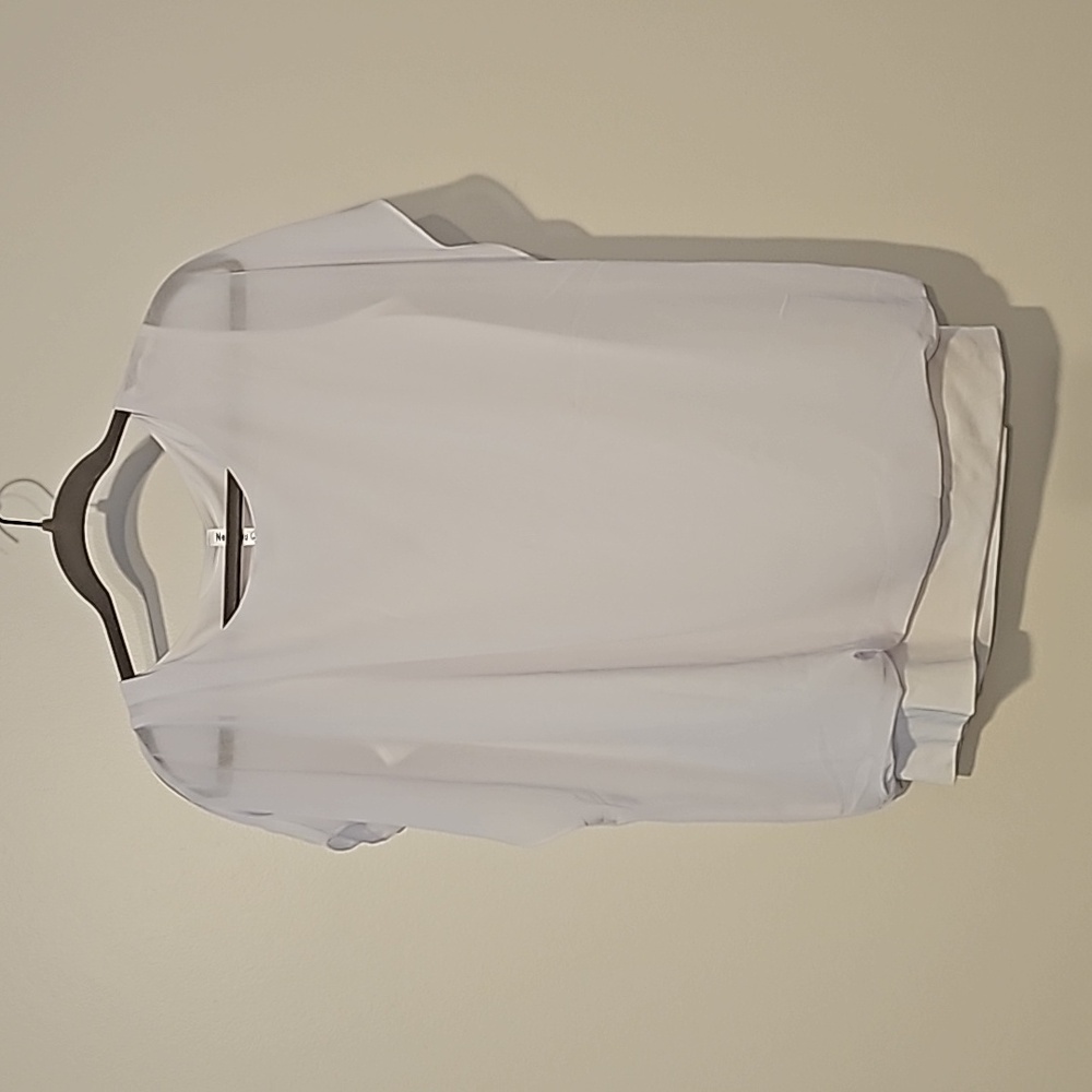 Women's loose fit white t shirt size large.